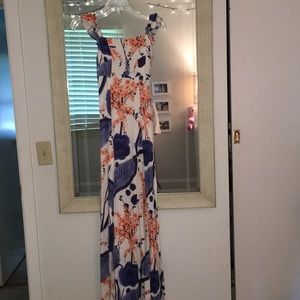 Off-the-shoulder maxi dress (dress on right)
